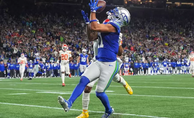Seattle Seahawks wide receiver Jaxon Smith-Njigba makes a catch and scores a touchdown on the play during the first half of an NFL football game against the Kansas City Chiefs in Seattle, Sunday, Oct. 25, 2026. (AP Photo/Lindsey Wasson)