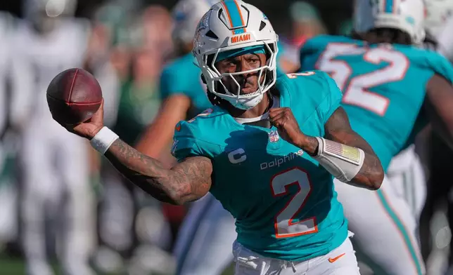 Miami Dolphins quarterback Malik Willis (2) passes in the second half of an NFL football game against the New York Jets in East Rutherford, N.J., Sunday, Oct. 25, 2026. (AP Photo/Seth Wenig)