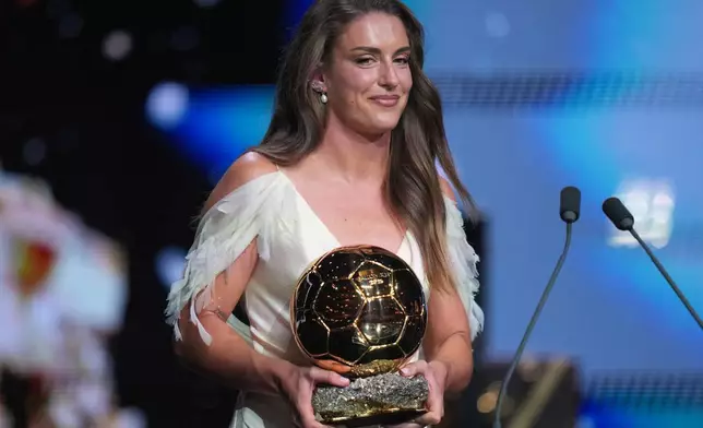 Spain's London City Lionesses' Alexia Putellas wins the player of the year trophy during the Ballon d'Or ceremony at the London Palladium Theatre in London, England, Monday, Oct. 26, 2026 . (AP Photo/Kin Cheung)