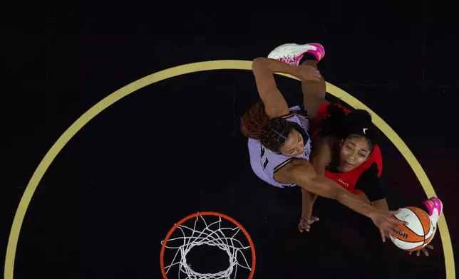 Golden State Valkyries center Kiah Stokes (41) blocks a shot by Atlanta Dream forward Angel Reese (5) during the first half of Game 2 of the WNBA basketball finals Monday, Oct. 19, 2026, in San Francisco. (Carlos Avila Gonzalez/San Francisco Chronicle via AP)
