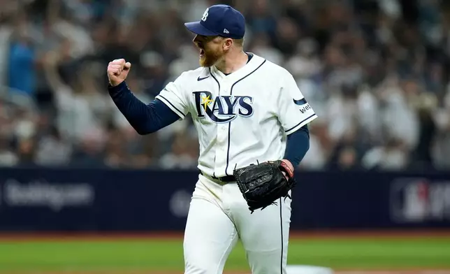 Tampa Bay Rays pitcher Drew Rasmussen celebrates after striking out New York Yankees' Cody Bellinger to end the top of the sixth inning of Game 1 of an American League Division Series baseball game Saturday, Oct. 3, 2026, in St. Petersburg, Fla. (AP Photo/Chris O'Meara)