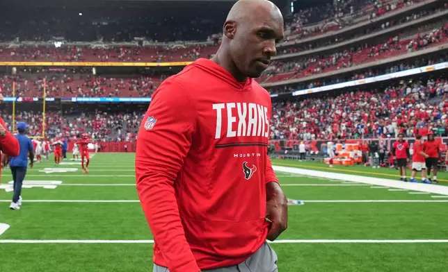 Houston Texans head coach DeMeco Ryans walks off the field following an overtime loss to the New York Giants in an NFL football game in Houston, Sunday, Oct. 25, 2026. (AP Photo/Eric Smith)