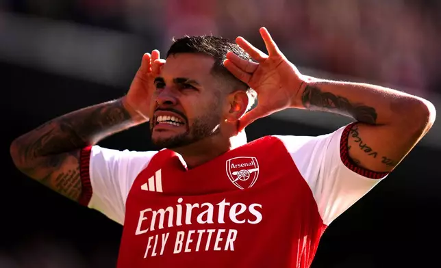 Arsenal's Bruno Guimaraes celebrates scoring his side's second goal during the English Premier League soccer match between Arsenal and Leeds United in London, Saturday, Oct. 10, 2026. ( John Walton/PA via AP)