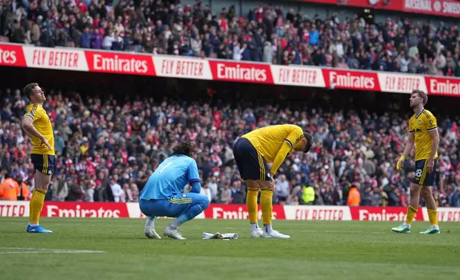 Leeds react disappointed after the English Premier League soccer match between Arsenal and Leeds United in London, Saturday, Oct. 10, 2026. (AP Photo/Alastair Grant)