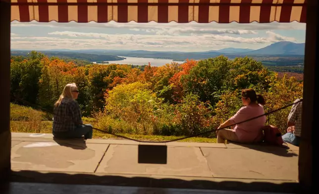 Colorful foliage adds to the view overlooking the Hudson River and Catskill Mountains at Olana, the former home of celebrated painter Frederic Church, Monday, Oct. 12, 2026, in Hudson, N.Y. (AP Photo/Robert F. Bukaty)