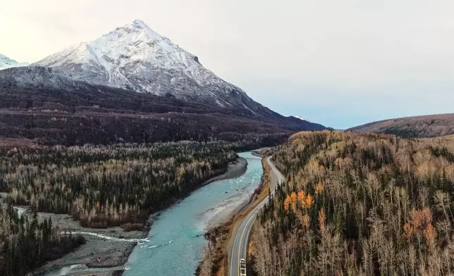 Kings Mountain is seen over the Matanuska River Wednesday, Oct. 14, 2026, near Chickaloon, Alaska. (AP Photo/Lindsey Wasson)