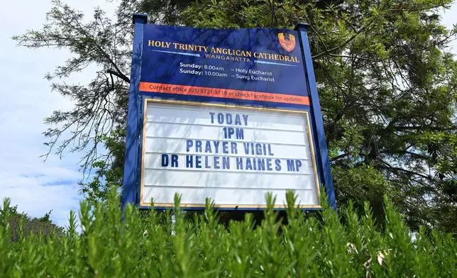 A church sign advertising a vigil for independent member of parliament Helen Haines at the Holy Trinity Anglican Cathedral in Wangaratta, Australia, Tuesday, Oct. 20, 2026. (James Ross/AAP Image via AP)