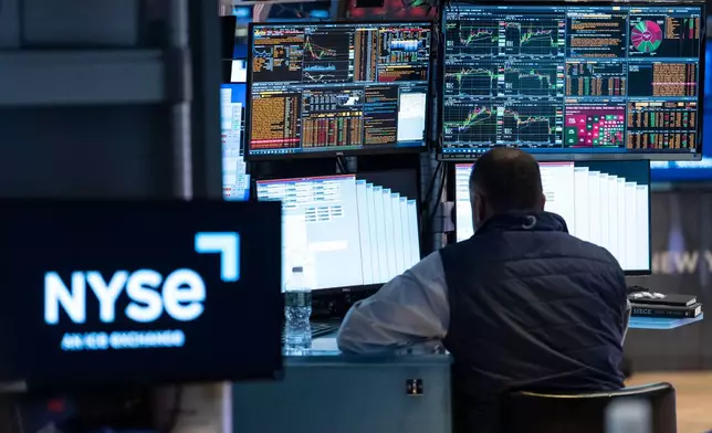 Specialist Dilip Patel works on the floor of the New York Stock Exchange, Thursday, Oct. 8, 2026, in New York. (AP Photo/Yuki Iwamura)