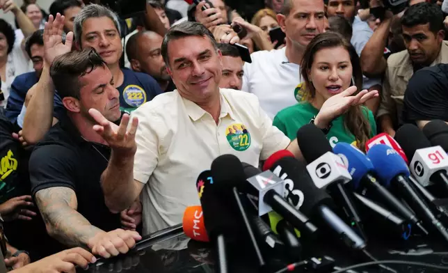 Opposition presidential candidate Sen. Flavio Bolsonaro speaks after voting during general elections in Rio de Janeiro, Sunday, Oct. 4, 2026. (AP Photo/Lucas Landau)