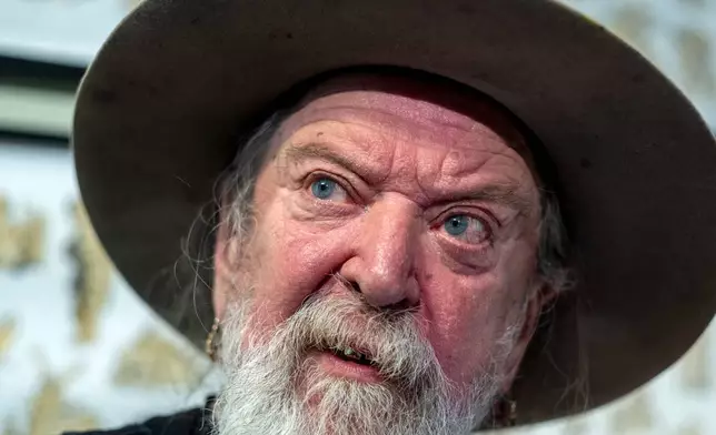 Tattoo artist Henk Schiffmacher poses for a photo in a studio in the Rembrandt House Museum in Amsterdam, Tuesday, Oct. 27, 2026. (AP Photo/Patrick Post)