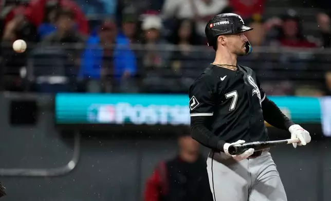 Chicago White Sox center fielder Brenton Doyle reacts after striking out in the third inning of Game 5 of baseball's American League Division Series against the Cleveland Guardians, Saturday, Oct. 10, 2026, in Cleveland. (AP Photo/Sue Ogrocki)