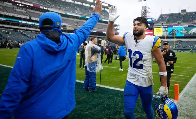 Los Angeles Rams wide receiver Puka Nacua (12) leaves the field after an NFL football game against the Philadelphia Eagles in Philadelphia, Sunday, Oct. 4, 2026. (AP Photo/Matt Slocum)