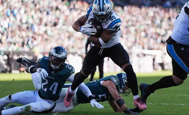 Carolina Panthers running back Chuba Hubbard scores a touchdown during the second half of an NFL football game against the Philadelphia Eagles in Philadelphia, Sunday, Oct. 18, 2026. (AP Photo/Matt Rourke)