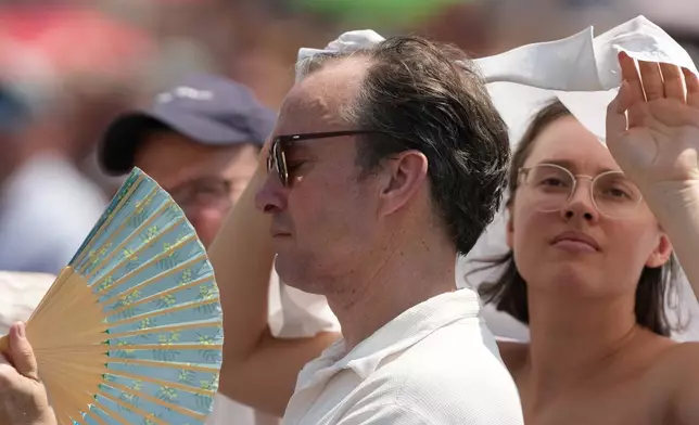 FILE - Faithful wait for the start of Pope Leo XIV Angelus prayer St. Peter's Square at the Vatican, Aug. 2, 2026. (AP Photo/Gregorio Borgia, File)