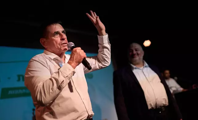 Yoav Segalovitz, a former police investigator running with the Ra'am party, speaks during a campaign event alongside Mansour Abbas, the party's leader, in Tel Aviv, Israel, Friday, Oct. 23, 2026, ahead of the country's general election. (AP Photo/David Goldman)