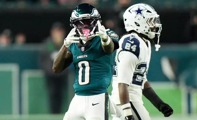 Philadelphia Eagles' Hollywood Brown celebrates a first down during the second half of an NFL football game against the Dallas Cowboys in Philadelphia, Monday, Oct. 26, 2026. (AP Photo/Chris Szagola)