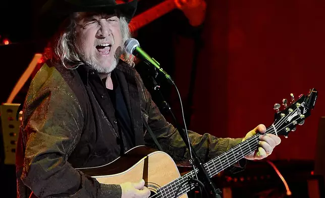 FILE - John Anderson performs at the ceremony for the 2013 inductions into the Country Music Hall of Fame in Nashville, Tenn., on Oct. 27, 2013. (AP Photo/Mark Zaleski, File)