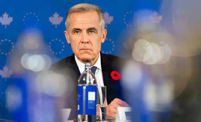 Canada Prime Minister Mark Carney looks on during a roundtable meeting with business leaders during the Canada-EU Summit, in Montreal, Thursday, Oct. 29, 2026. (Christopher Katsarov/The Canadian Press via AP)