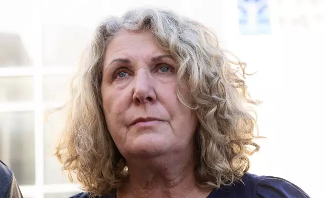 Debra Robinson, mother of Australian brothers Callum and Jake Robinson, looks up during a news conference after the trial of the men accused of murdering the brothers and an American friend, in Ensenada, Mexico, Friday, Oct. 9, 2026. (AP Photo/Karen Castaneda)