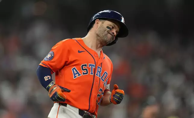 Houston Astros' Jose Altuve reacts after hitting a fly out to end the bottom of the fifth inning in Game 2 of baseball's American League Wild Card Series against the Chicago White Sox, Wednesday, Sept. 30, 2026, in Houston. (AP Photo/Karen Warren)