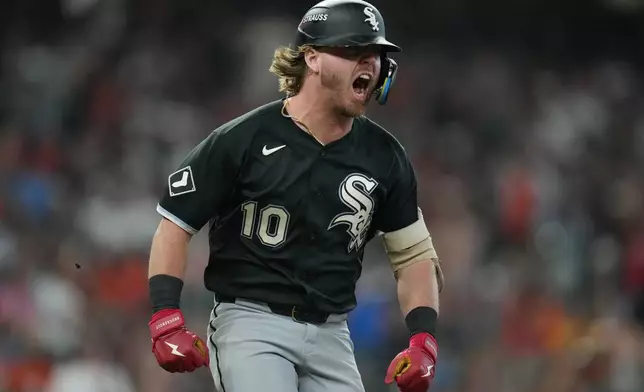 Chicago White Sox's Chase Meidroth (10) celebrates while running the bases after hitting a 3-run home run during the sixth inning in Game 2 of baseball's American League Wild Card Series against the Houston Astros, Wednesday, Sept. 30, 2026, in Houston. (AP Photo/Karen Warren)