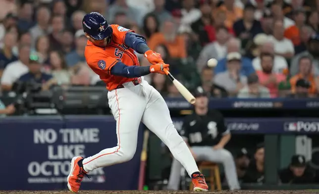Houston Astros' Cam Smith hits a solo home run during the second inning in Game 2 of baseball's American League Wild Card Series against the Chicago White Sox, Wednesday, Sept. 30, 2026, in Houston. (AP Photo/Karen Warren)