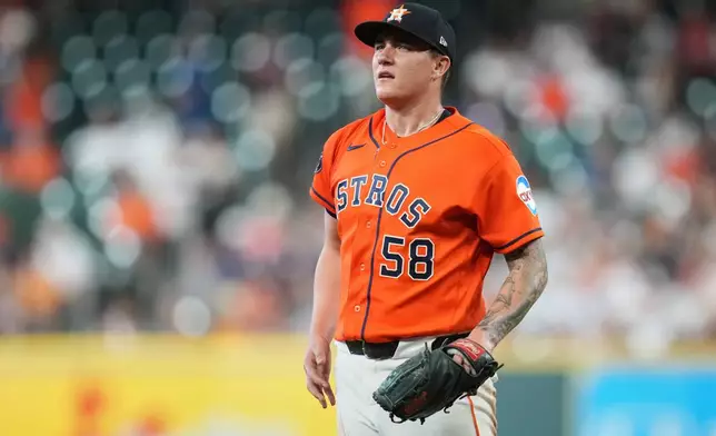 Houston Astros starting pitcher Hunter Brown (58) reacts after a RBI-single hit by Chicago White Sox's Tristan Peters during the first inning in Game 2 of baseball's American League Wild Card Series, Wednesday, Sept. 30, 2026, in Houston. (AP Photo/Karen Warren)