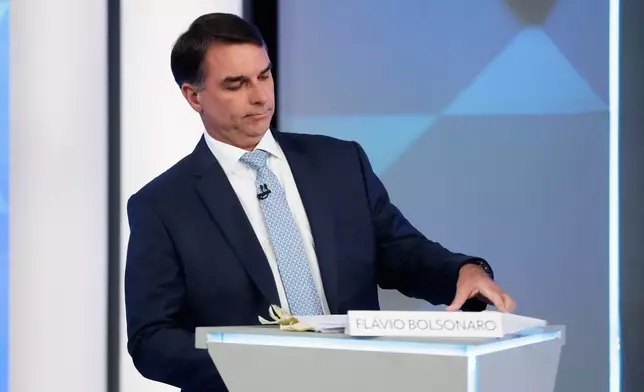 Opposition presidential candidate Sen. Flavio Bolsonaro takes part in a televised presidential debate days before the presidential runoff election in Rio de Janeiro, Friday, Oct. 23, 2026. (AP Photo/Bruna Prado)