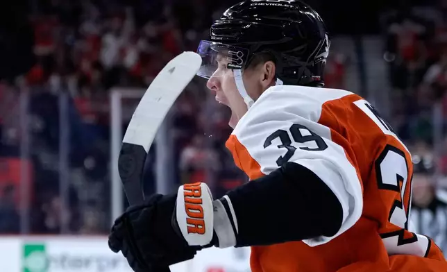 Philadelphia Flyers' Matvei Michkov celebrates after scoring a goal during the second period of an NHL hockey game against the Colorado Avalanche Monday, Oct. 19, 2026, in Philadelphia. (AP Photo/Matt Slocum)
