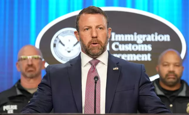 Secretary of Homeland Security Markwayne Mullin, with Immigration and Customs Enforcement (ICE) officials, speaks during a news conference at ICE Headquarters, Friday, Oct. 9, 2026, in Washington. (AP Photo/Jacquelyn Martin)