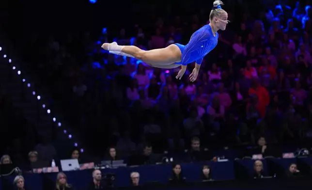 Reese Esponda, of the United States, competes in the floor exercise during the women's qualifications at the Artistic Gymnastics World Championships in Rotterdam, the Netherlands, Sunday, Oct. 18, 2026. (AP Photo/Francisco Seco)