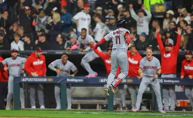 Cleveland Guardians' Jose Ramirez celebrates after hitting a 2-run home run during the fifth inning in Game 4 of baseball's American League Division Series against the Chicago White Sox, Thursday, Oct. 8, 2026, in Chicago. (AP Photo/Melissa Tamez)