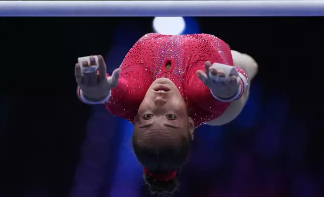 Kaylia Nemour, of Algeria, competes in the the uneven bars during the women's all-around final at the Artistic Gymnastics World Championships in Rotterdam, the Netherlands, Friday, Oct. 23, 2026. (AP Photo/Francisco Seco)