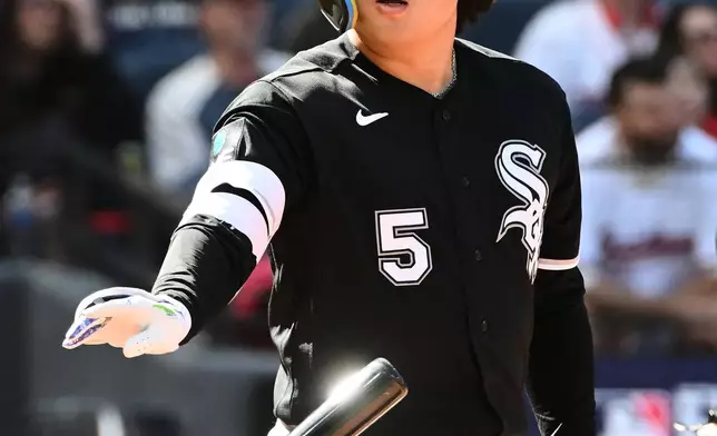 Chicago White Sox's Munetaka Murakami tosses his bat after hitting a two-run home run against the Cleveland Guardians during the fourth inning in Game 1 of baseball's American League Division Series, Saturday, Oct. 3, 2026, in Cleveland. (AP Photo/Phil Long)