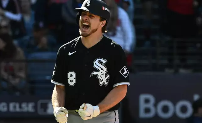 Chicago White Sox's Kyle Teel celebrates after scoring on an RBI double from Colson Montgomery during the seventh inning against the Cleveland Guardians in Game 1 of baseball's American League Division Series, Saturday, Oct. 3, 2026, in Cleveland. (AP Photo/Phil Long)