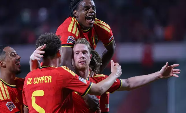 Belgium's Kevin De Bruyne, centre, celebrates with teammates after scoring his side's second goal during the Nations League soccer match between Belgium and Turkey in Liege, Belgium, Friday, Oct. 2, 2026. (AP Photo/Omar Havana)