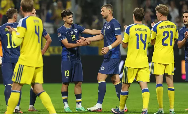 Bosnia's Edin Dzeko walks off the pitch as he plaued his last international game during the Nations League soccer match between Bosnia and Herzegovina and Sweden in Zenica, Friday, Oct. 2, 2026. (AP Photo/Armin Durgut)