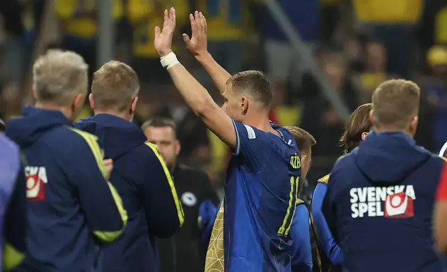 Bosnia's Edin Dzeko walks off the pitch as he plaued his last international game during the Nations League soccer match between Bosnia and Herzegovina and Sweden in Zenica, Friday, Oct. 2, 2026. (AP Photo/Armin Durgut)