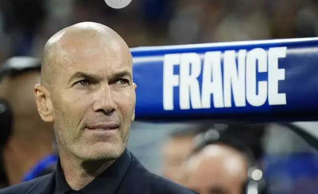 France's head coach Zinedine Zidane prepares for the start of the UEFA Nations League Group A soccer match between France and Italy in Saint-Denis near Paris, Friday, Oct. 2, 2026. (AP Photo/Teresa Suarez)