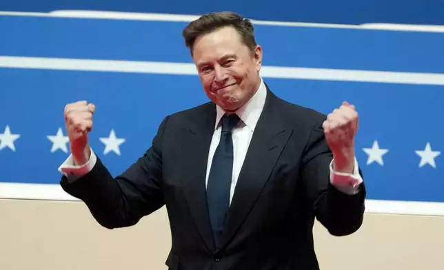 FILE - Elon Musk arrives to speak at an indoor Presidential Inauguration parade event in Washington, Jan. 20, 2025. (AP Photo/Matt Rourke, File)
