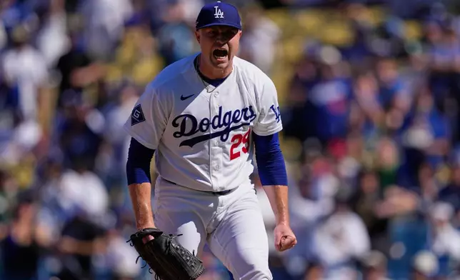 Los Angeles Dodgers starting pitcher Tarik Skubal celebrates after striking out Atlanta Braves' Austin Riley during the fifth inning of Game 1 of a National League Division Series baseball game Saturday, Oct. 3, 2026, in Los Angeles. (AP Photo/Mark J. Terrill)