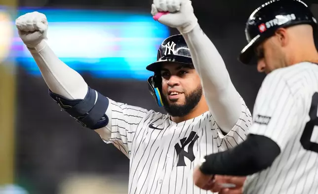 New York Yankees' Luis García Jr. reacts after a single against the Boston Red Sox during the sixth inning in Game 2 of baseball's American League Wild Card Series, Wednesday, Sept. 30, 2026, in New York. (AP Photo/Yuki Iwamura)