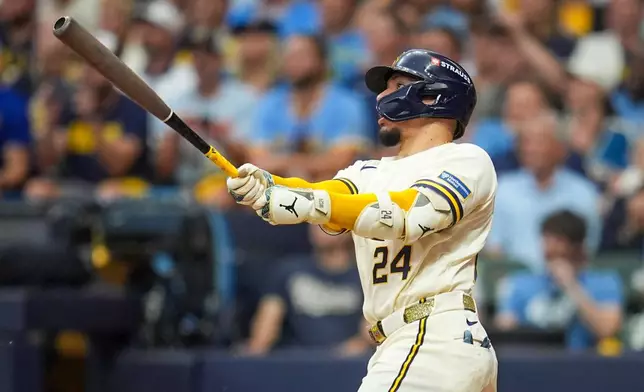 Milwaukee Brewers catcher William Contreras connects for a home run during the fifth inning of Game 2 of baseball's National League Championship Series between the Milwaukee Brewers and the Los Angeles Dodgers, Monday, Oct. 12, 2026, in Milwaukee. (AP Photo/Abbie Parr)