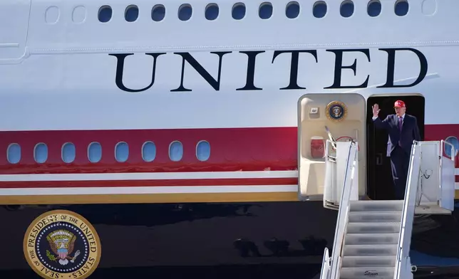 President Donald Trump arrives on Air Force One at Laughlin Bullhead International Airport for a campaign rally, Wednesday, Oct. 14, 2026, in Bullhead, Ariz. (AP Photo/Alex Brandon)