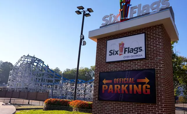 Attractions are seen at Six Flags Over Georgia, about 15 miles (24 kilometers) northwest of Atlanta, Tuesday, Oct. 13, 2026. (AP Photo/Mike Stewart)
