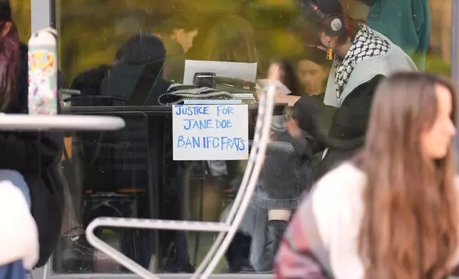 A sign is displayed in support of Jane Doe during a sit-in protest at Cornell University, Wednesday, Oct. 7, 2026, in Ithaca, N.Y. (AP Photo/Matt Burkhartt)