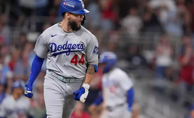 Los Angeles Dodgers center fielder Andy Pages (44) celebrates after hitting a two run RBI-single during the seventh inning in Game 4 of baseball's National League Division Series against the Atlanta Braves, Wednesday, Oct. 7, 2026, in Atlanta. (AP Photo/Mike Stewart)