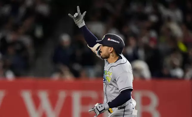Tampa Bay Rays' Victor Mesa Jr. celebrates his two-run home run during the sixth inning in Game 3 of baseball's American League Division Series against the New York Yankees, Wednesday, Oct. 7, 2026, in New York. (AP Photo/Seth Wenig)