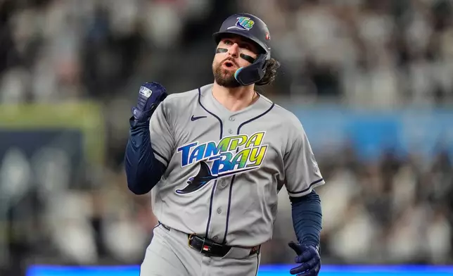 Tampa Bay Rays' Ryan Vilade celebrates his solo home run durin the fourth inning in Game 3 of baseball's American League Division Series against the New York Yankees, Wednesday, Oct. 7, 2026, in New York. (AP Photo/Seth Wenig)