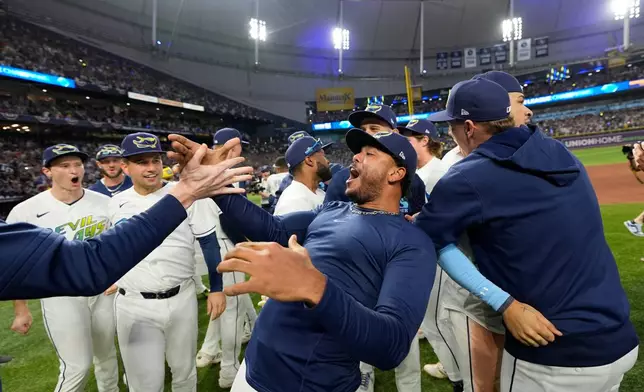 Tampa Bay Rays pitcher Freddy Peralta celebrates their win against the Cleveland Guardians in Game 6 of an American League Championship Series baseball game in St. Petersburg, Fla. Monday, Oct. 19, 2026. (AP Photo/David J. Phillip)